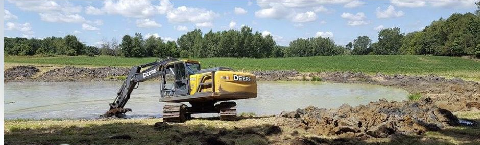 Farm pond muck cleanout and deepening in Metamora Michigan